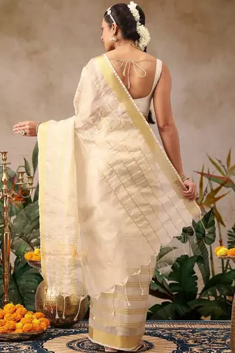 Off white woven silk blend ethnic saree with blouse piece