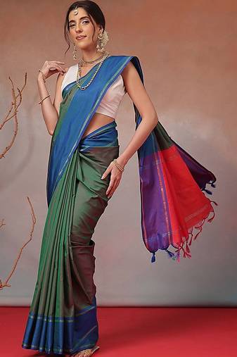 Green woven art silk traditional saree with blouse piece
