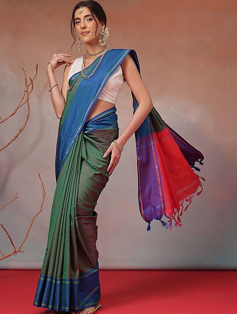 Green woven art silk traditional saree with blouse piece