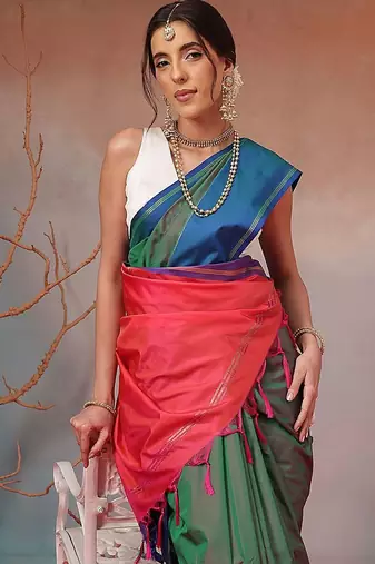 Green woven art silk traditional saree with blouse piece