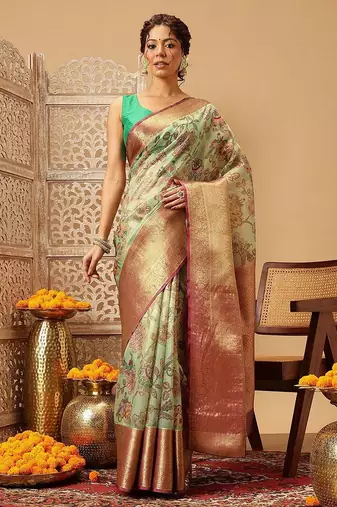 Green printed silk blend ethnic saree with blouse piece