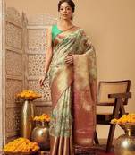 Green printed silk blend ethnic saree with blouse piece