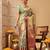 Green printed silk blend ethnic saree with blouse piece