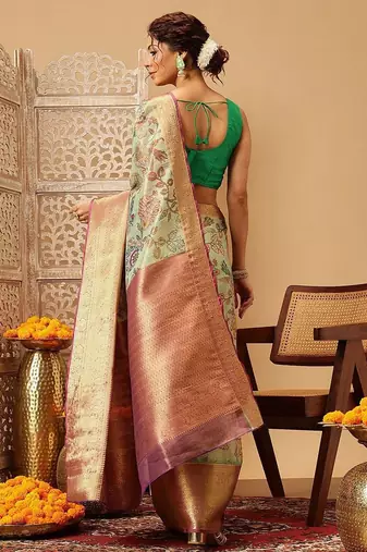 Green printed silk blend ethnic saree with blouse piece