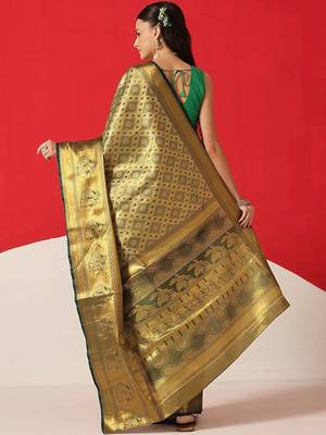 Golden woven silk blend ethnic saree with blouse piece 2