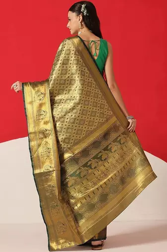 Golden woven silk blend ethnic saree with blouse piece