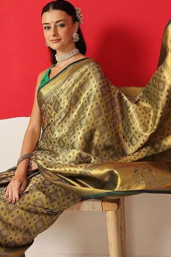 Golden woven silk blend ethnic saree with blouse piece