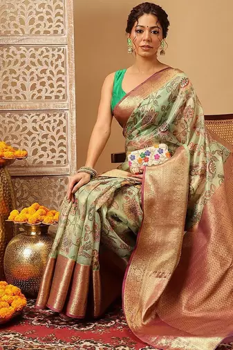 Green printed silk blend ethnic saree with blouse piece