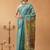 Teal printed silk cotton ethnic saree with blouse piece