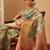 Green printed silk blend ethnic saree with blouse piece