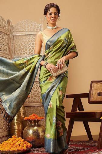 Green printed art silk ethnic saree with blouse piece