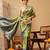 Green printed art silk ethnic saree with blouse piece