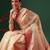 Cream zari tissue traditional saree with blouse piece