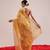 Yellow printed silk cotton ethnic saree with blouse piece