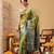 Green printed art silk ethnic saree with blouse piece