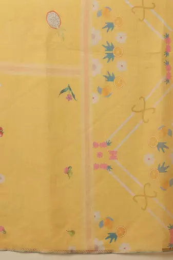Yellow printed silk cotton ethnic saree with blouse piece