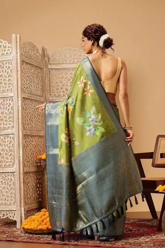 Green printed art silk ethnic saree with blouse piece