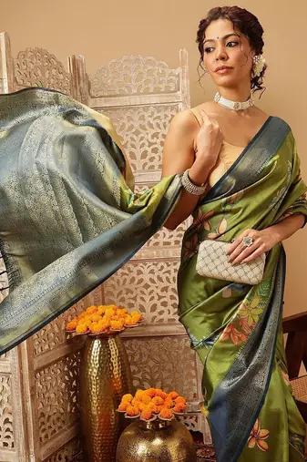 Green printed art silk ethnic saree with blouse piece