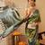 Green printed art silk ethnic saree with blouse piece
