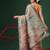 Beige printed tissue traditional saree with blouse piece
