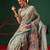 Beige printed tissue traditional saree with blouse piece