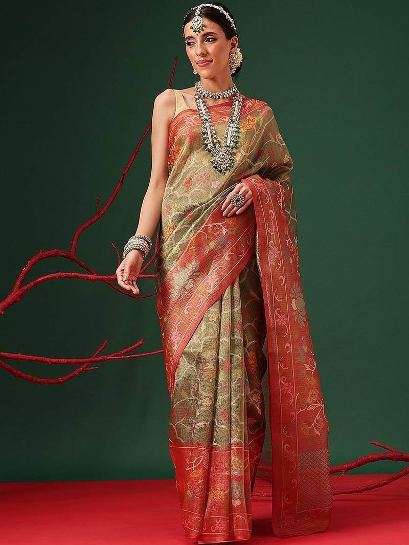 Green woven tissue party wear saree with blouse piece