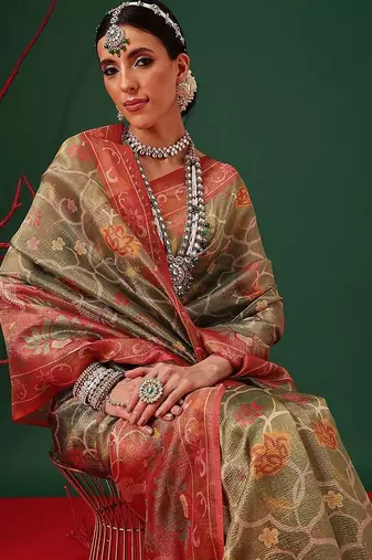 Green woven tissue party wear saree with blouse piece