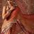 Orange printed cotton blend ethnic saree with blouse piece