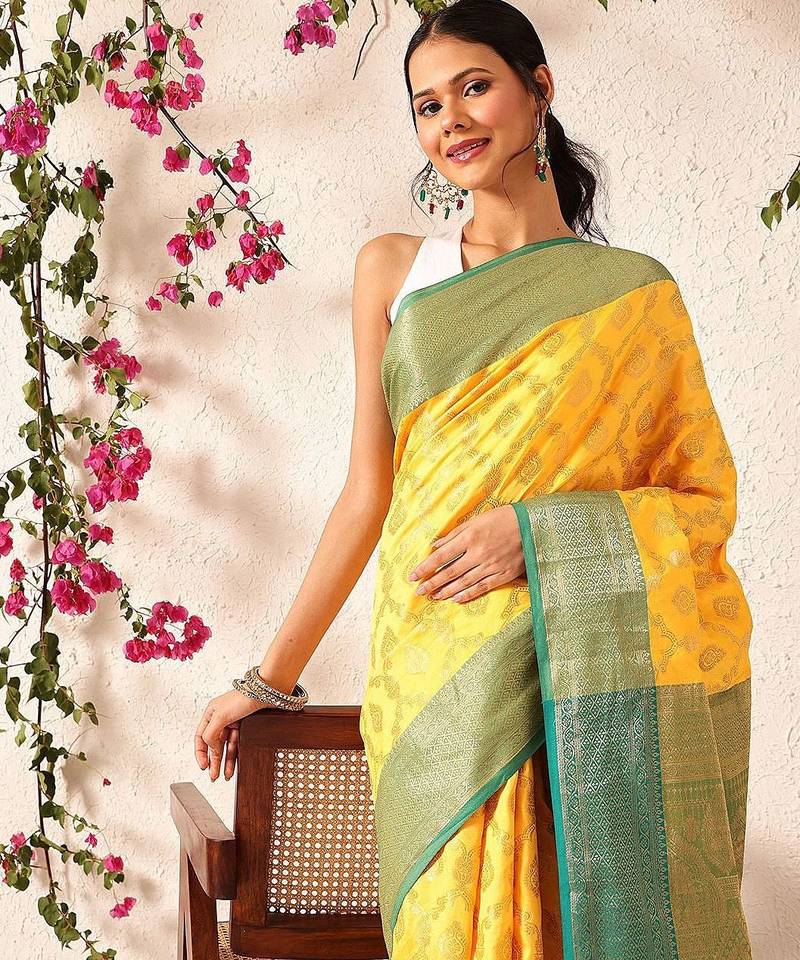 Yellow woven silk blend ethnic saree with blouse piece