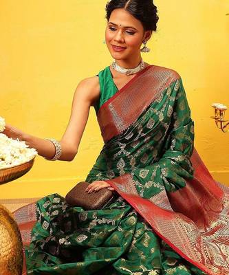 Green woven silk blend ethnic saree with blouse piece 1
