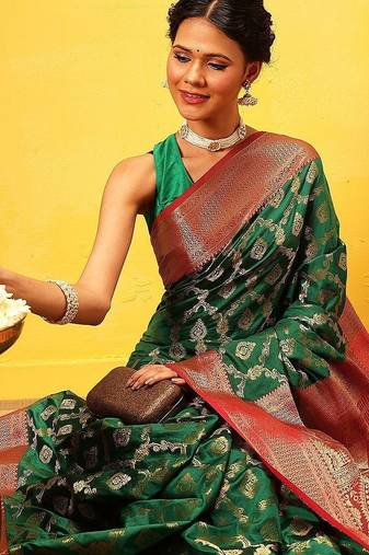 Green woven silk blend ethnic saree with blouse piece