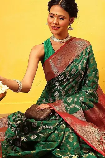 Green woven silk blend ethnic saree with blouse piece