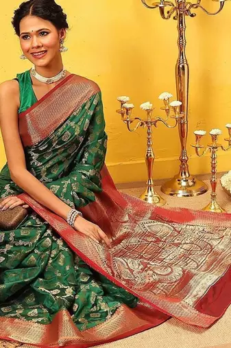 Green woven silk blend ethnic saree with blouse piece