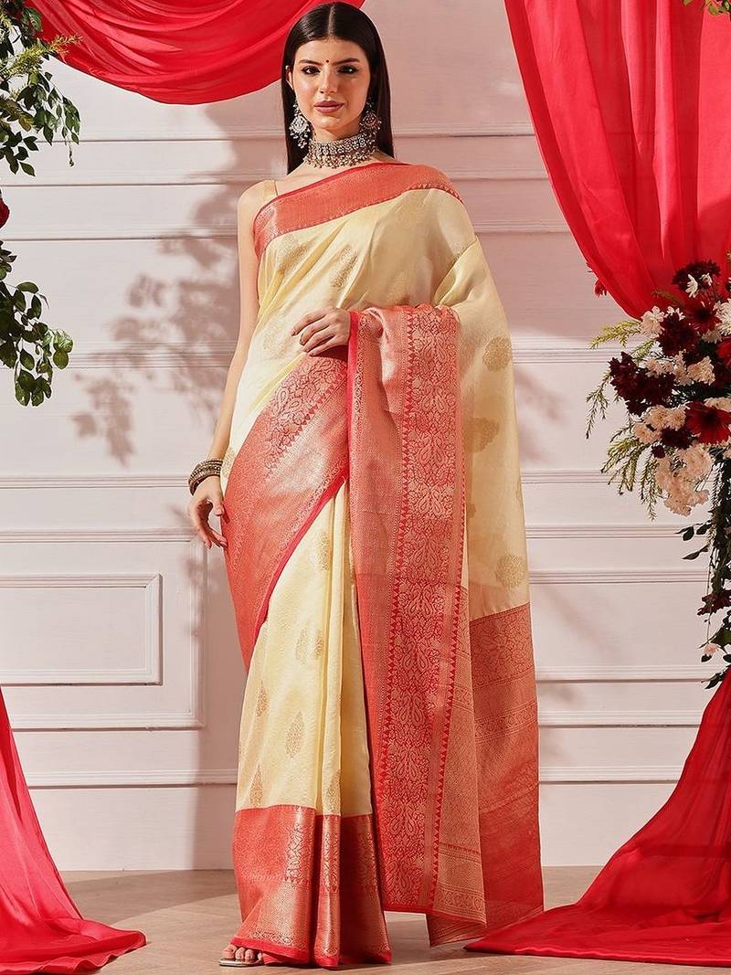 Cream woven art silk traditional saree with blouse piece