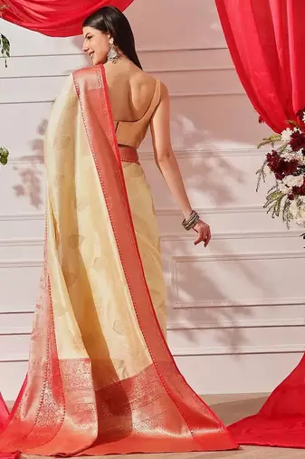 Cream woven art silk traditional saree with blouse piece