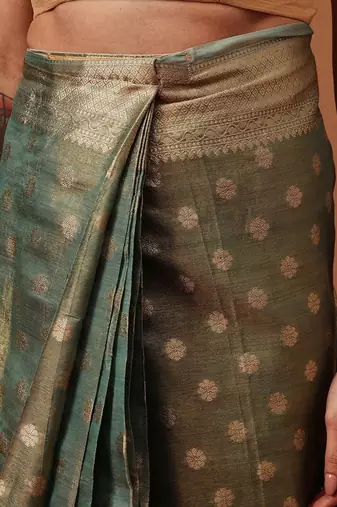 Teal woven tissue party wear saree with blouse piece