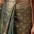 Teal woven tissue party wear saree with blouse piece