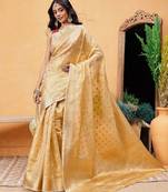 Beige woven tissue party wear saree with blouse piece
