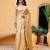 Beige woven tissue party wear saree with blouse piece