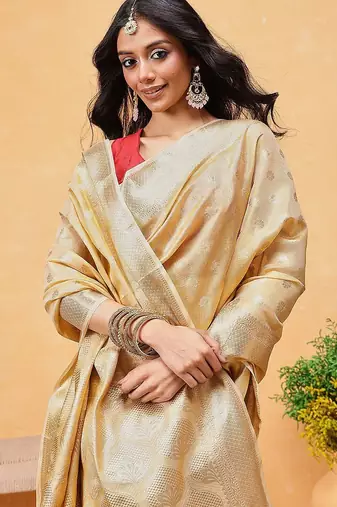 Beige woven tissue party wear saree with blouse piece