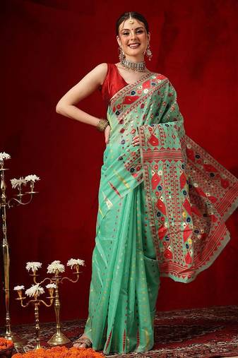 Green woven cotton blend traditional saree with blouse piece