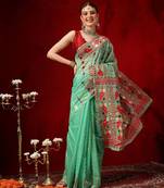 Green woven cotton blend traditional saree with blouse piece