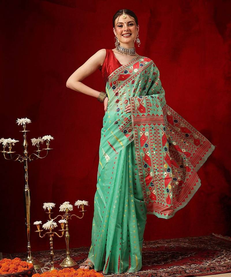 Green woven cotton blend traditional saree with blouse piece