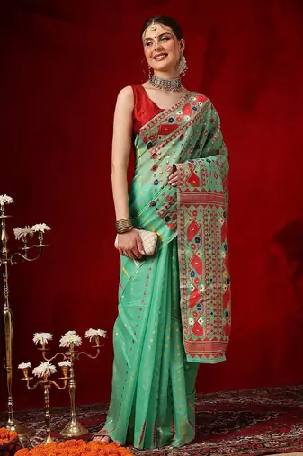 Green woven cotton blend traditional saree with blouse piece