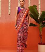 Red printed silk blend ethnic saree with blouse piece