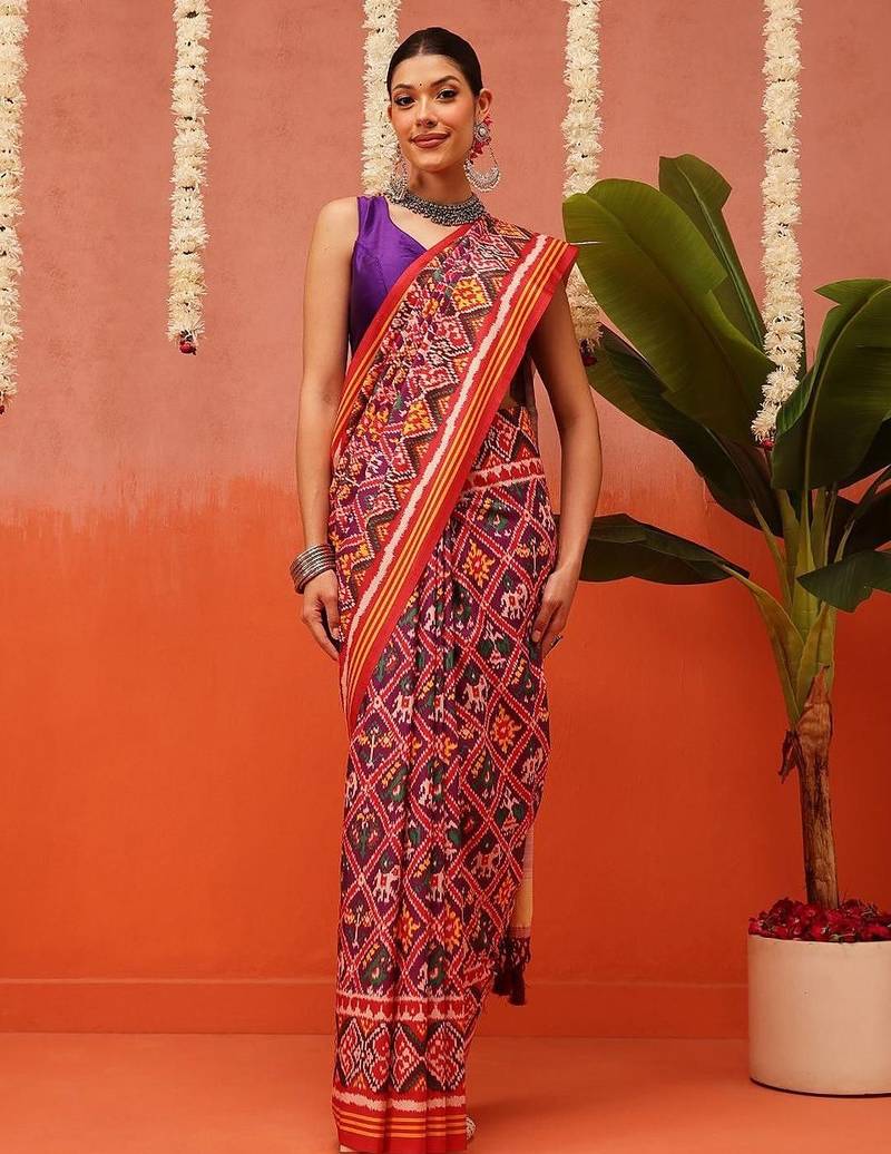 Red printed silk blend ethnic saree with blouse piece