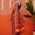Red printed silk blend ethnic saree with blouse piece
