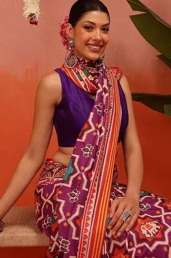 Orange printed silk blend ethnic saree with blouse piece