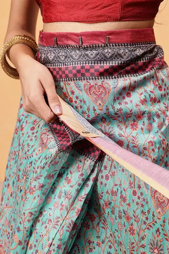 Teal printed cotton blend ethnic saree with blouse piece