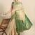Green woven tissue party wear saree with blouse piece